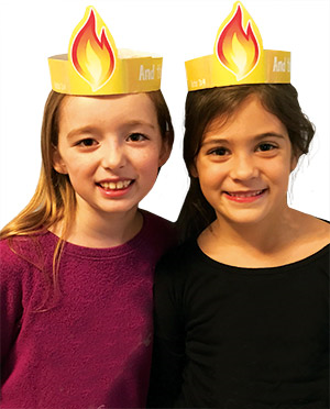 Picture of two girls wearing "Pentecost Flames Hat"