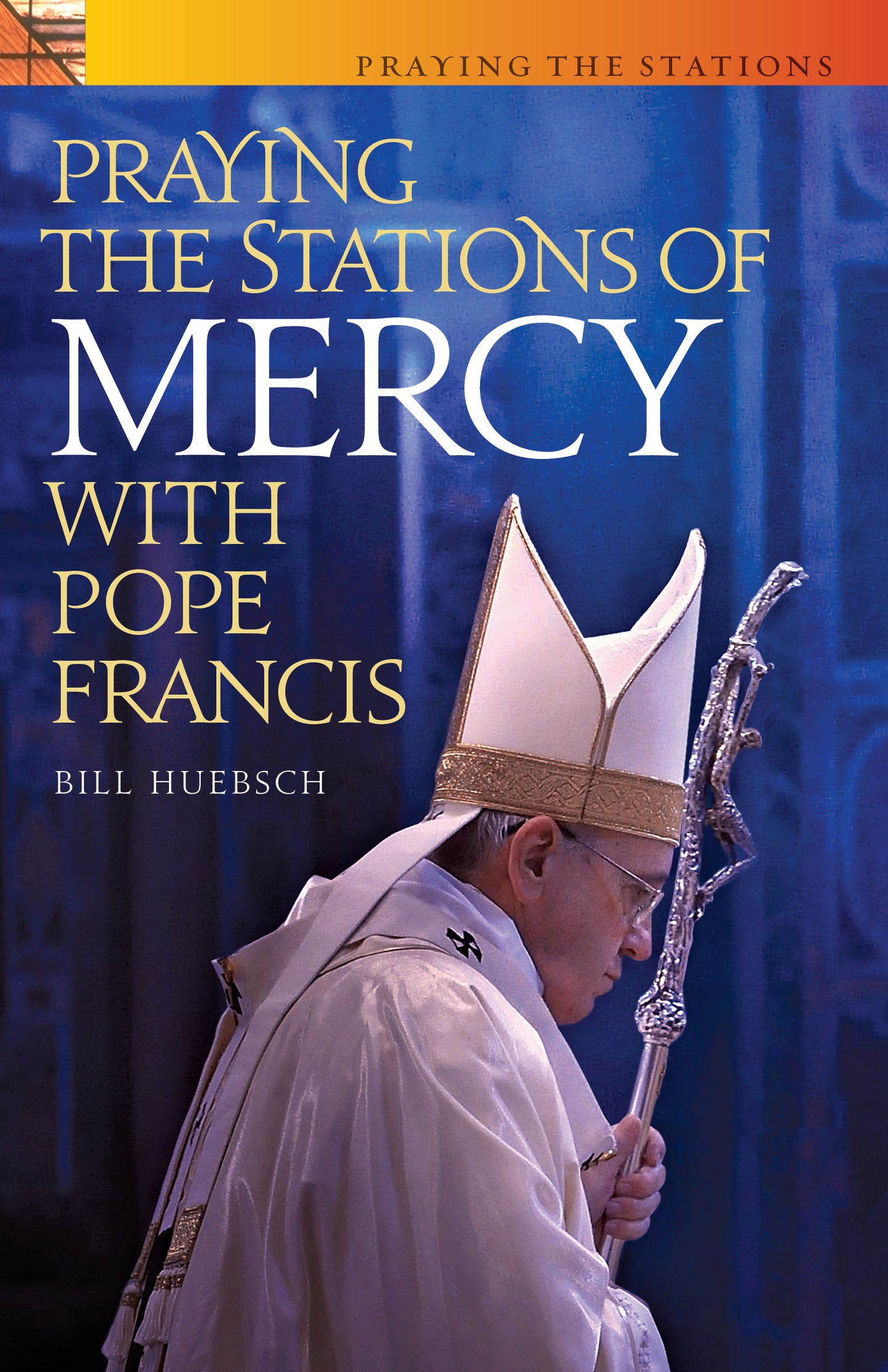 "Praying the Stations of Mercy with Pope Francis" by Bill Huebsch cover features a picture of Pope Francis in a blue background.